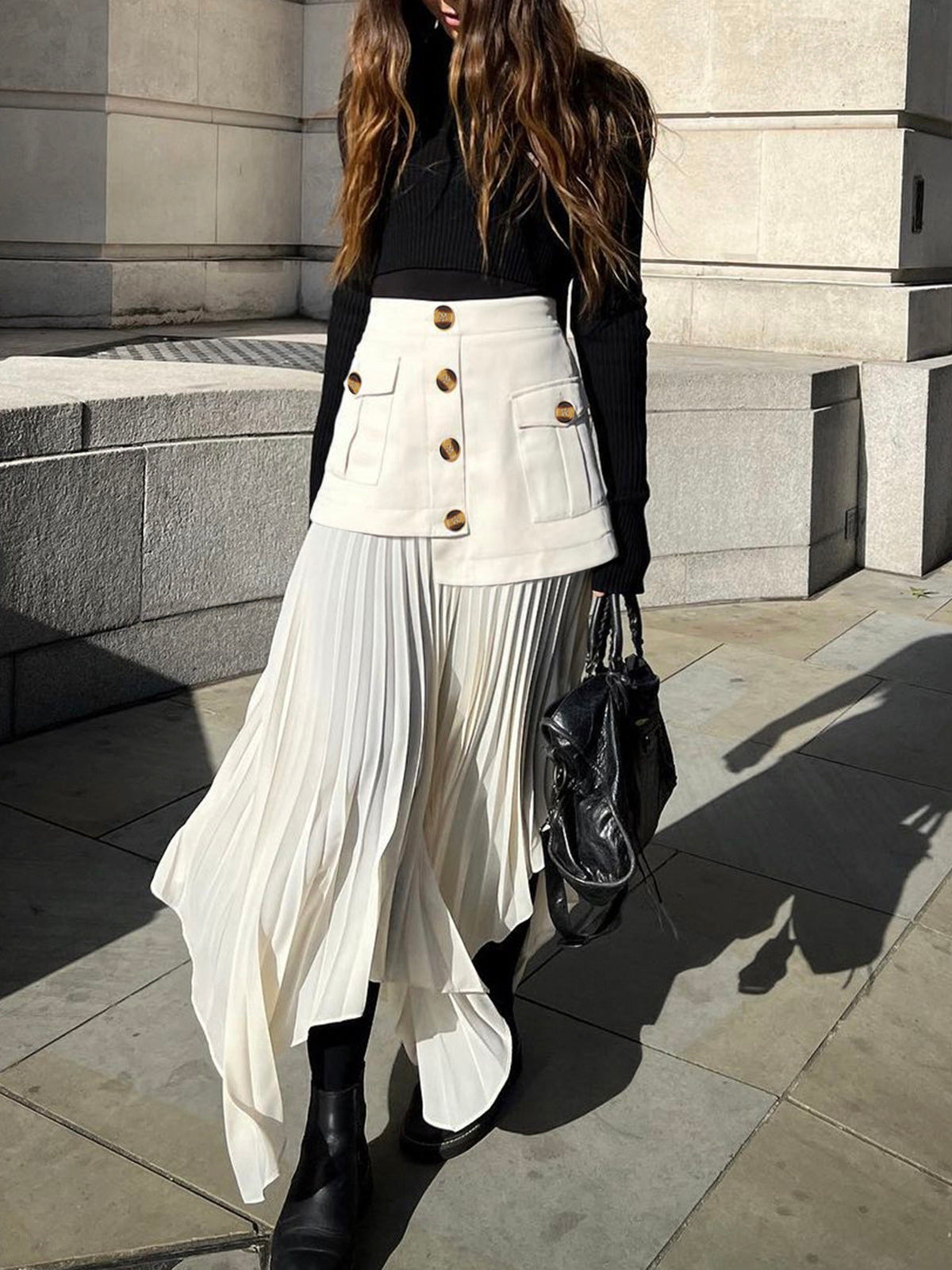 Modieuze Midi Rok met Asymmetrische Plooien